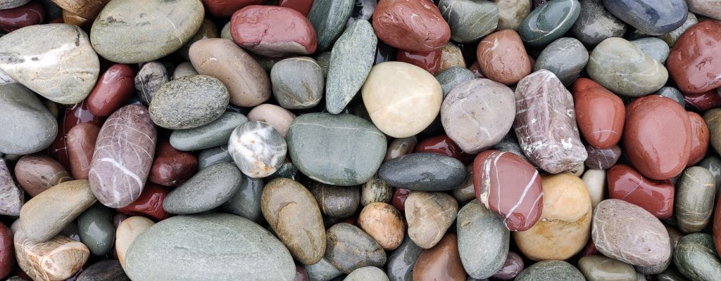 Wet stones on a beach.