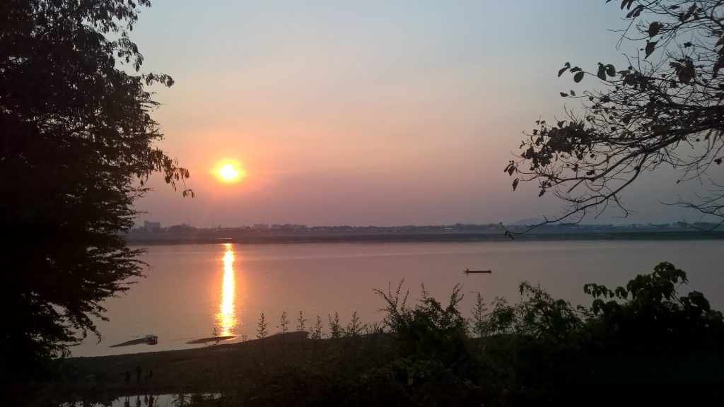 A blissful sunset on the bank of the mighty Mekong River.