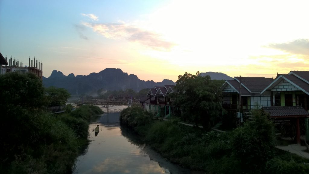 A serene view from a bridge in Vang Vieng, Laos.