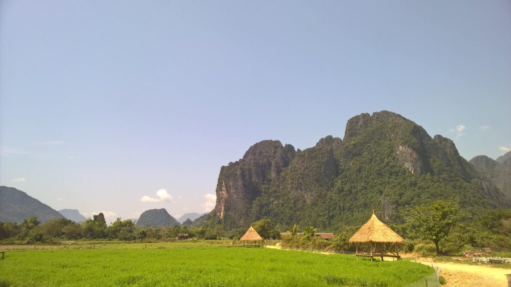 A green view in Vang Vieng towards the karst mountains.