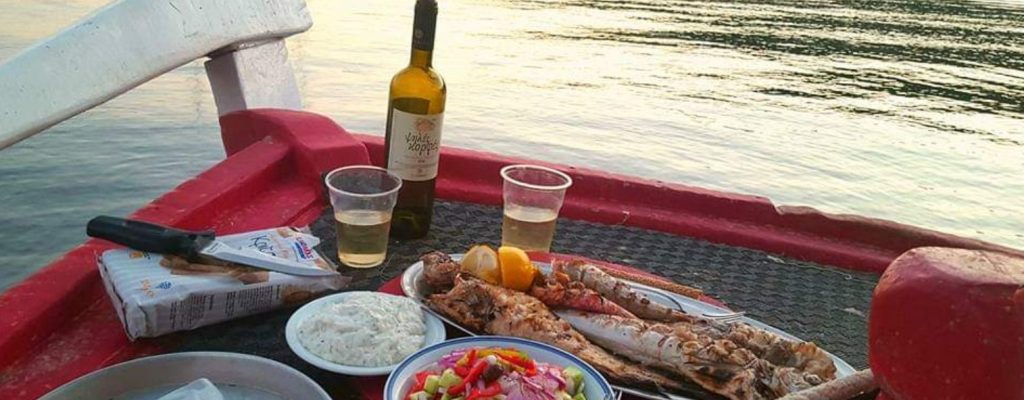 Dinner in the fishing boat in Samos.