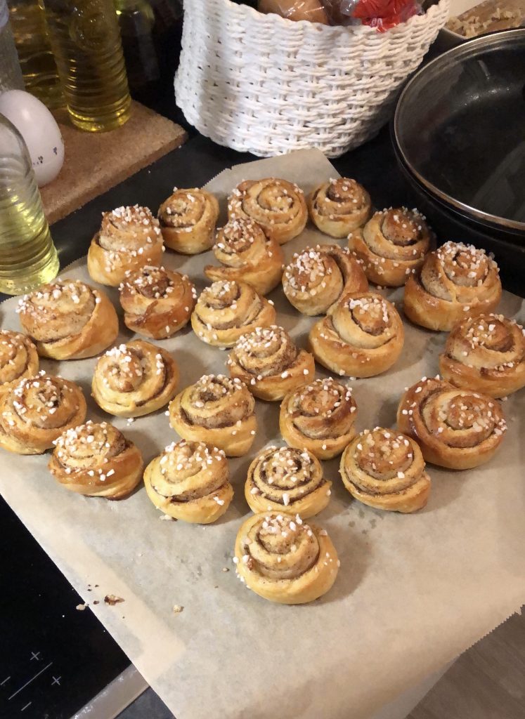 Oven fresh cinnamon roll buns in the table