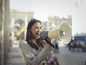 the promoter using a megaphone