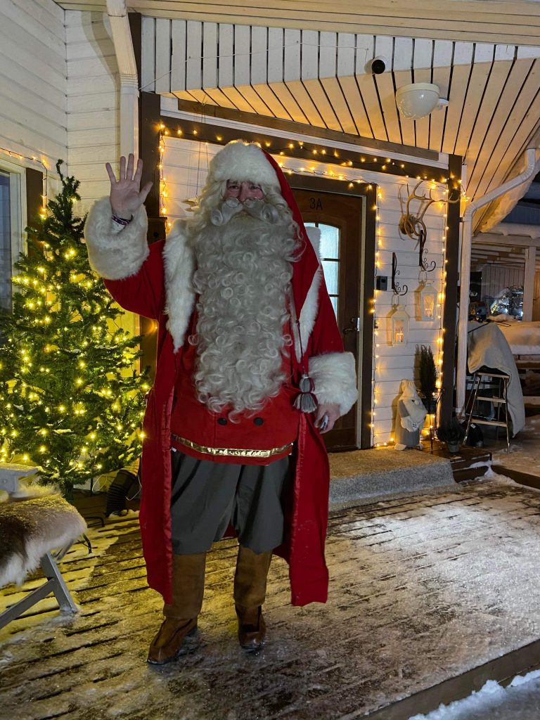 Santa coming from the private meeting.