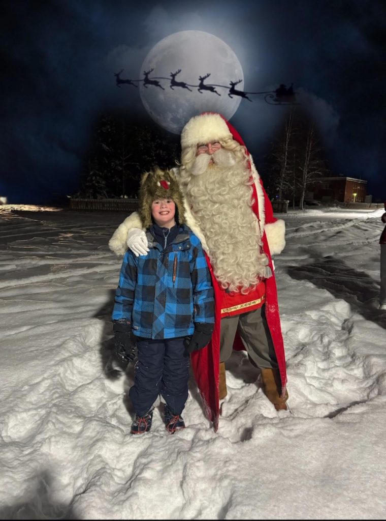 A boy from Ireland, two happy faces and the reindeers flying.