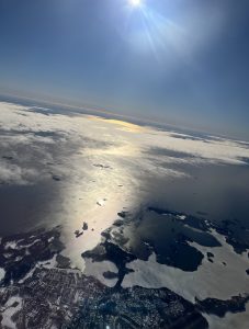 Finnish coast in a sunny day as seen from an airplane
