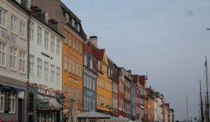 Colourful buildings by a harbor in Copenhagen Denmark