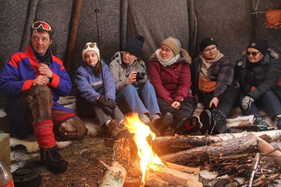 Group around a Campfire in Laavu