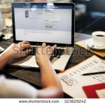 stock-photo-bangkok-thailand-october-young-woman-using-facebook-application-on-her-laptop-323829242